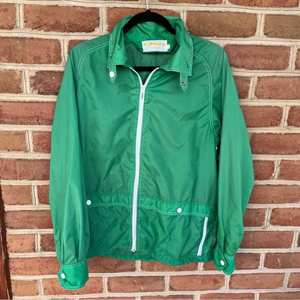 Green and white vintage zip up windbreaker. Ladies size Large. Outdoor events